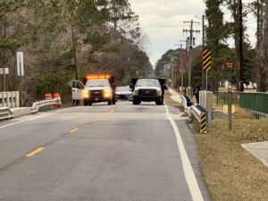 Trucks staging at bridge